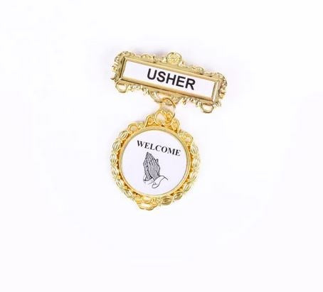 Badge-Ethnic-Usher-Welcome-(Praying Hands)-Pin Back-Brass-Fancy Round